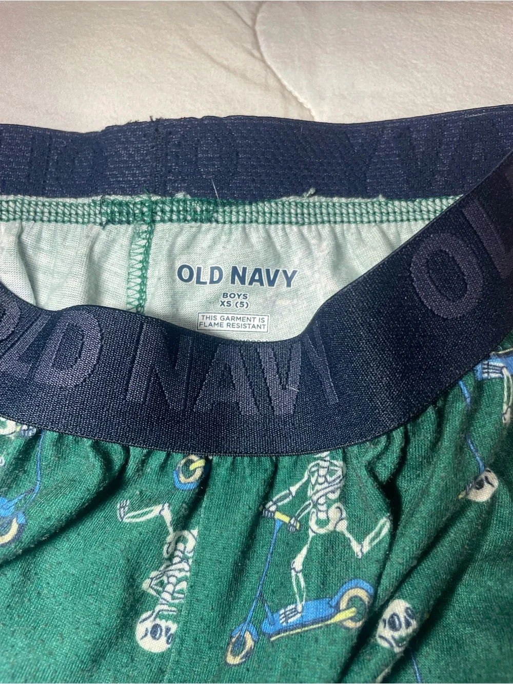 Old Navy Green Skeleton Scooter Pajama Set with Navy Waistband